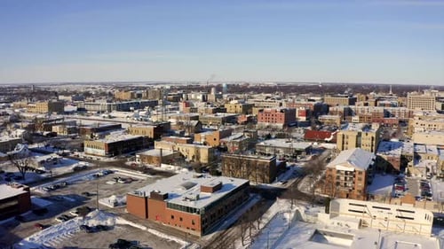 Aerial View of Snow Covered City in Winter