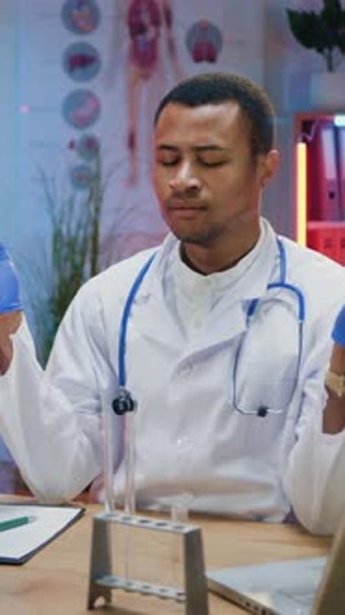 Focused Medical Professional Meditating in Lab Environment