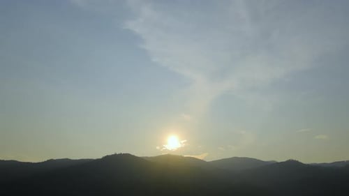 Majestic Mountain Sunset with Golden Light Rays