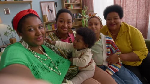 Happy Family Poses for Camera in Living Room