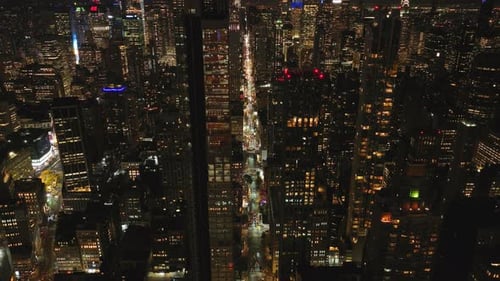 Aerial Views Capture Vibrant Manhattan Streets in New York City at Night Bustling with Traffic