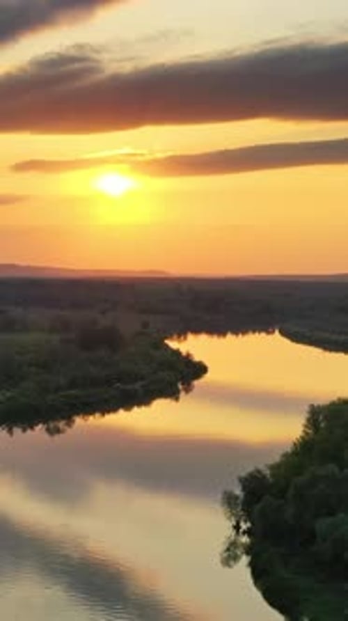 Sunrise or Sunset with Forest and River