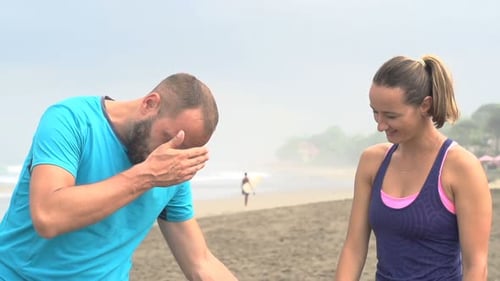 Tired Joggers Resting on Beach, Super 120