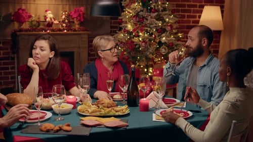 Family and Friends Celebrate Christmas Dinner Together