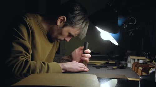 Tanner Working in Workshop