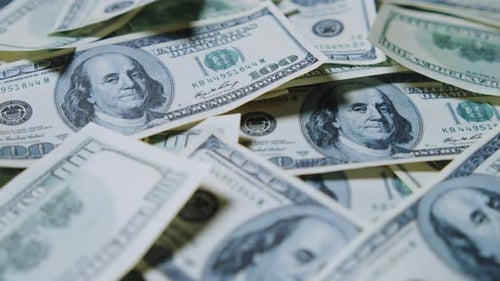 Pile of United States One Hundred Dollar Bills