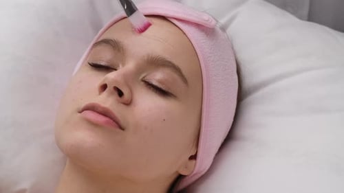 Cream Applied to Face in Beauty Salon