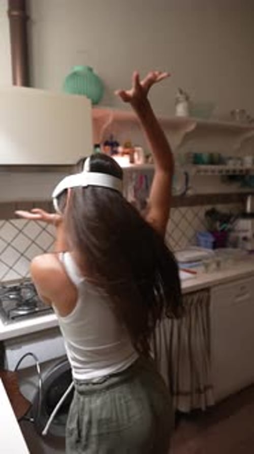 Woman Using VR Headset and Dancing