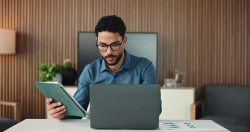 Businessman, laptop or tablet in office with review for finance statistics, audit check or report