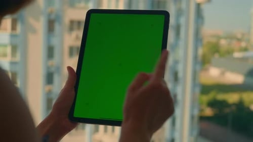 Lady Using App Digital Tablet in Apartment
