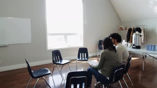 Support group members plan meeting together at community center