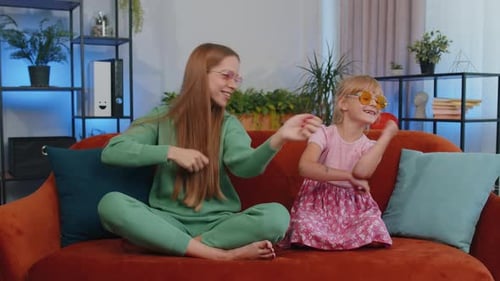Happy Two Teenage Girls Siblings Best Friends Couple Dancing at Home Trendy Dance Disco Party