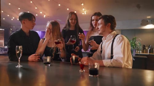 Group of Friends Talking in Night Bar Young Cheerful Joyful Men and Women Talking Chatting Laughing