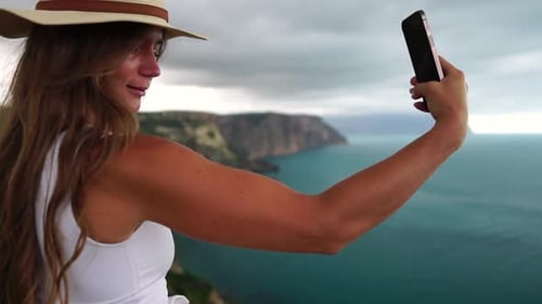 Woman Travel Sea Happy Tourist in Hat Enjoy Taking Picture Outdoors for Memories Woman Traveler