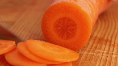 Cutting Carrots with a Knife on a Wooden Table ASMR Video of Cutting Vegetables