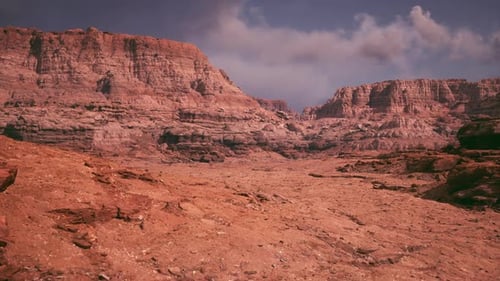 A Vast Desert Landscape Showcasing Rocky Formations Under a Clear Sky