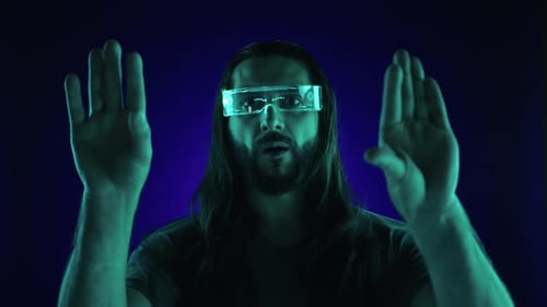 Man Interacts with Futuristic Augmented Reality Interface