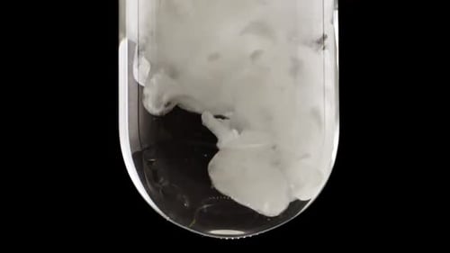 White Cloud Dissolving in Test Tube Experiment