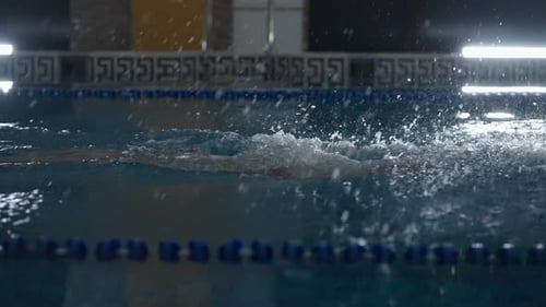 Healthy Lifestyle And Sport Activity Woman Swimmer Swimming In Pool Slow Motion Butterfly Style