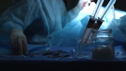 Close Up of Syringes Containing Extracted Human Fat Cells for Lipofilling or Stem Cell Treatment
