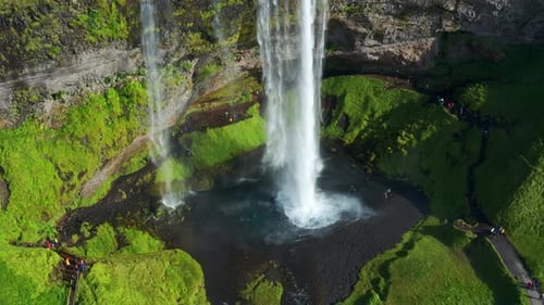 The Beautiful Waterfall Of Seljalandsfoss In South Iceland On A Sunny Summer Day - aerial shot