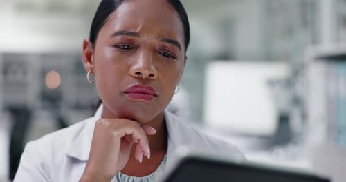Woman Scientist Uses Tablet in Lab Close Up