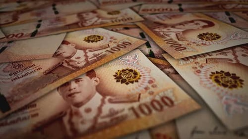 Thailand Baht 1000 banknote flying over money surface
