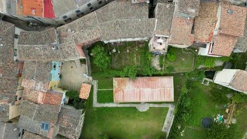 Birds eye view of rooftops in a historic and small mountain village in the south of france.
