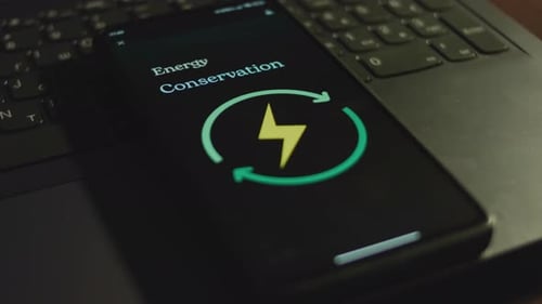 Energy Conservation Inscription on Smartphone Screen Graphic Presentation with Renewable Energy