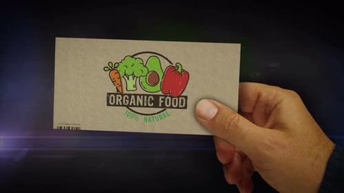 Hand Holding Illustrated Organic Food Logo Card Reveal