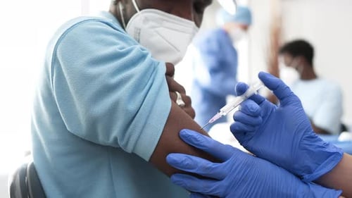 Vaccination in Clinic by Medical Staff