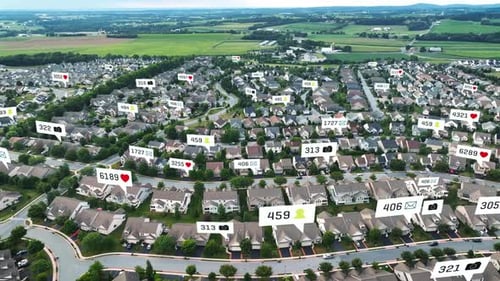 Large American neighborhood receiving texts, likes, notifications and alerts. High aerial view housi