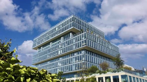 Office Building Windows Building with Many Corporate Offices of Success Companies