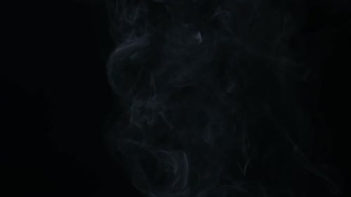 Grey Smoke Rising on Dark Background