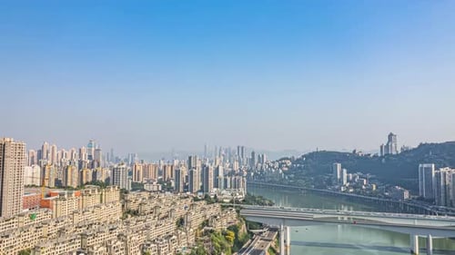Chongqing city river cityscape with bridges aerial China timelapse overlooking Yuzhong District
