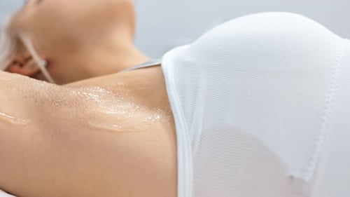 Close Up Of Woman's Arm With Clear Gel