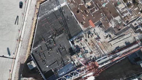 Aerial View of Construction Workers on Building Site