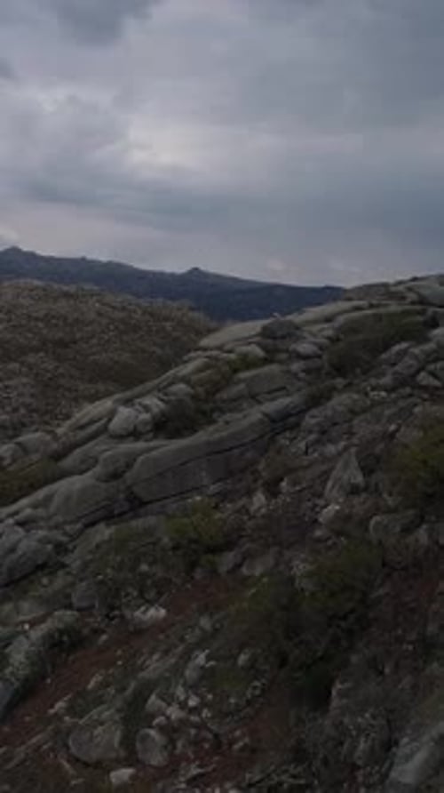 Vertical Video of High Mountains Rocks Formation Aerial View