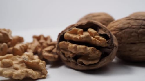 Close-Up of Walnuts on White Surface