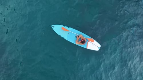 Aerial View Exploring the Mediterranean Lagoon on Paddleboards Stunning Coastal Scenery