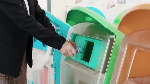 Recycling Bottle in Urban Environment