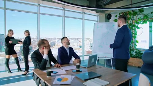 Business team discussing new business project together in office. Business meeting