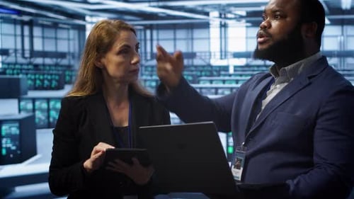 Coworkers in Data Center Doing Brainstorming Fixing Errors