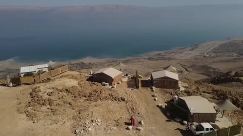 Desert Landscape View with Tent-Cabins