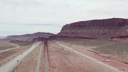 Interstate Highway Road into Moab, Utah Desert - Aerial Flight