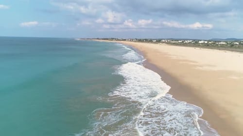 Beautiful aerial view of blue sea and holiday beach destination in Cadiz Spain