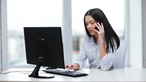 Of Attractive Office Worker Taking Phone Call