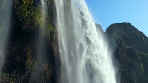 Beautiful and Powerful Seljalandsfoss Waterfall in Iceland - aerial descending