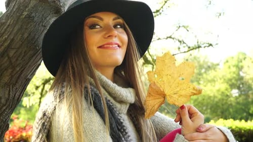 Fashion Autumn Girl Relaxing In Park