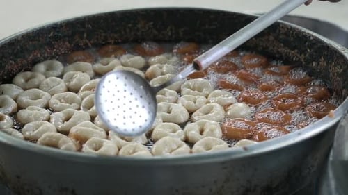 A traditional Turkish dessert. It is called “lokma”.